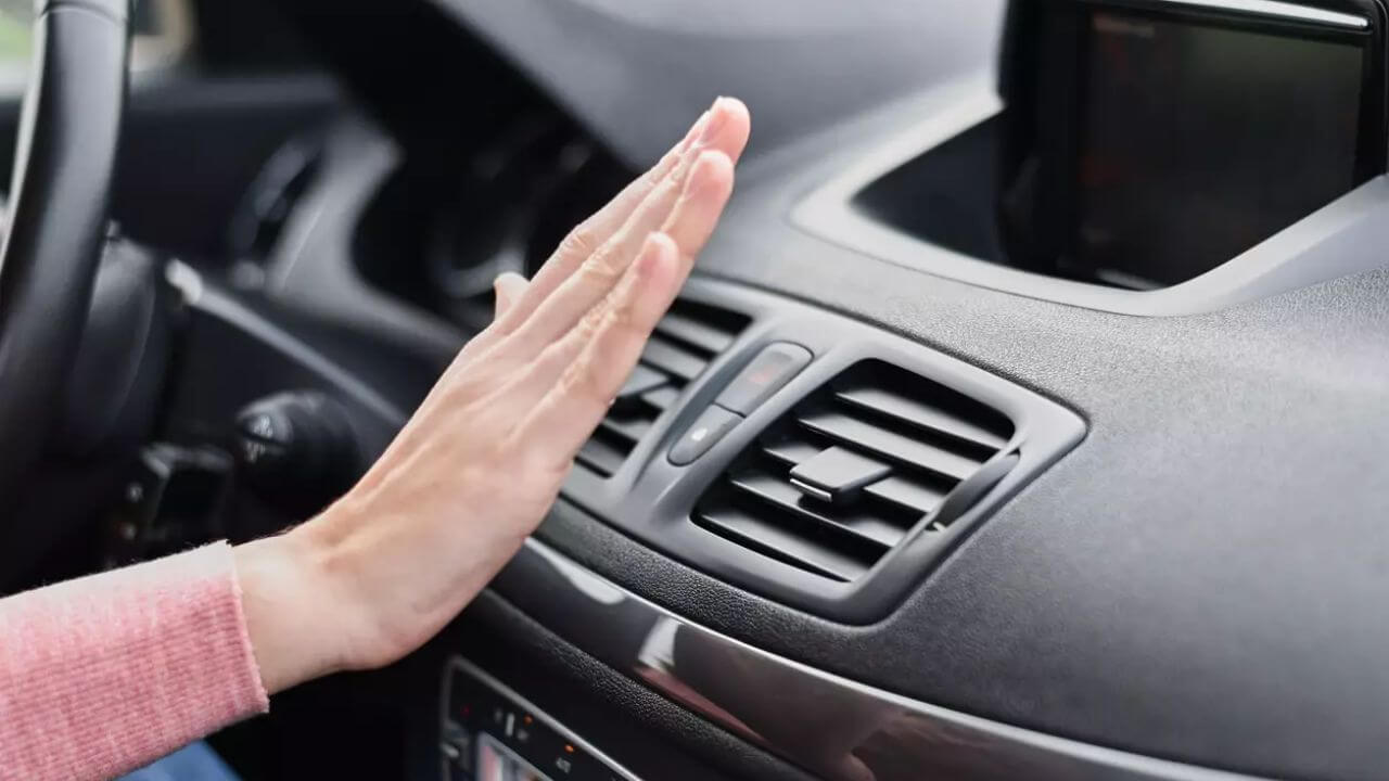 car ac blowing hot air